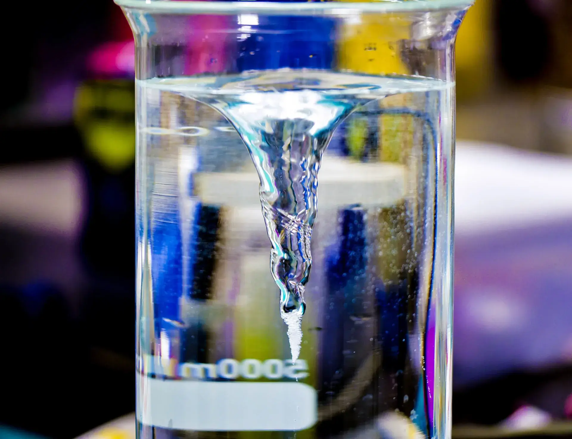 Beaker of liquid on a stirrer in the chemistry laboratory
